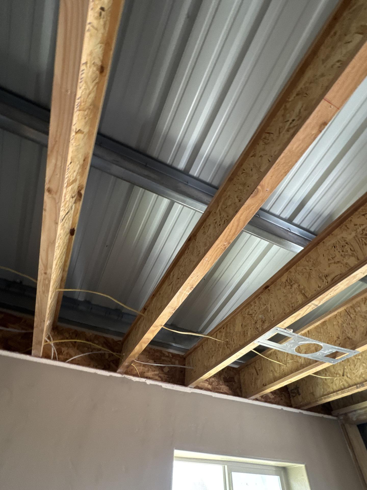 Professional demolition of contaminated ceiling materials