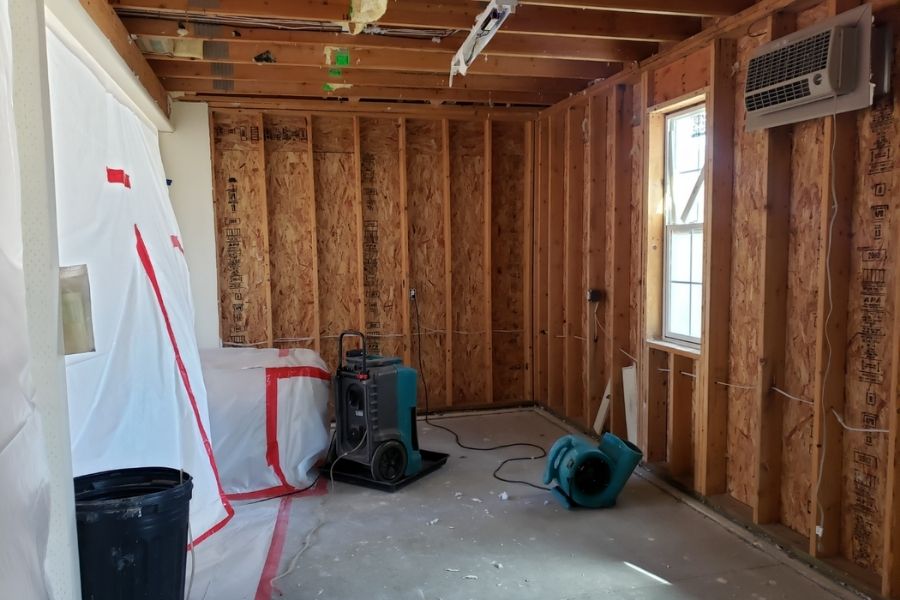 Professional water damage restoration equipment in action