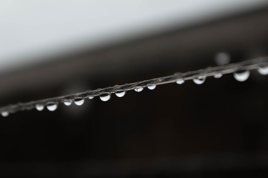Condensation and frost forming on frozen pipes