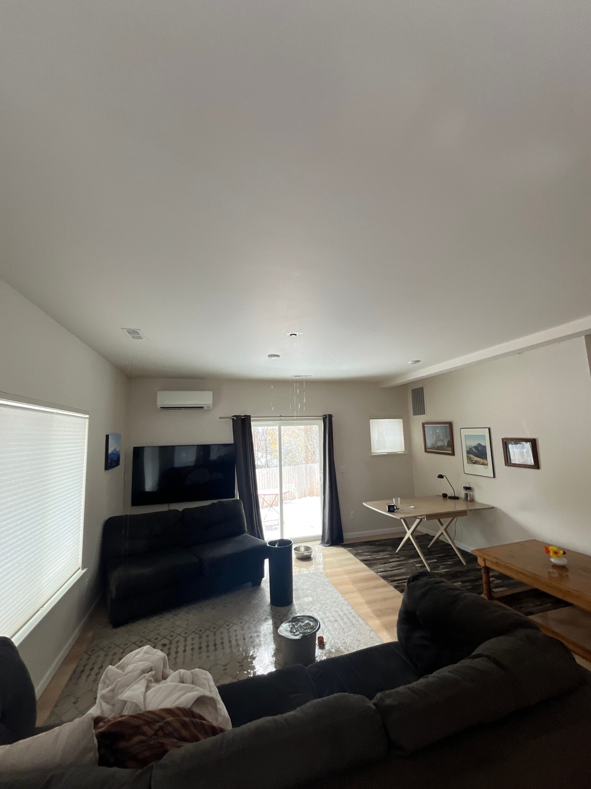 Ceiling water damage cleanup in progress at Aspen home