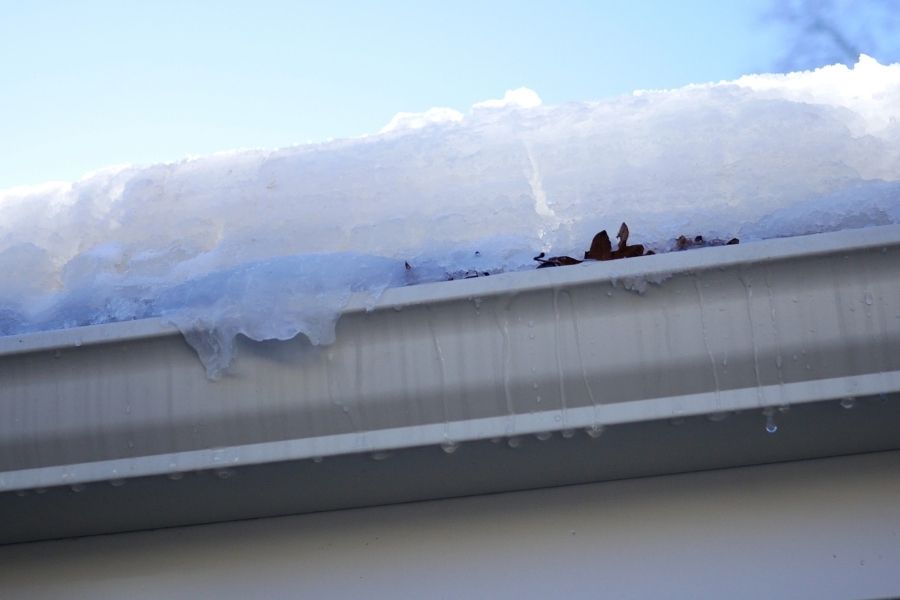 Clean gutters free of snow and debris for spring thaw