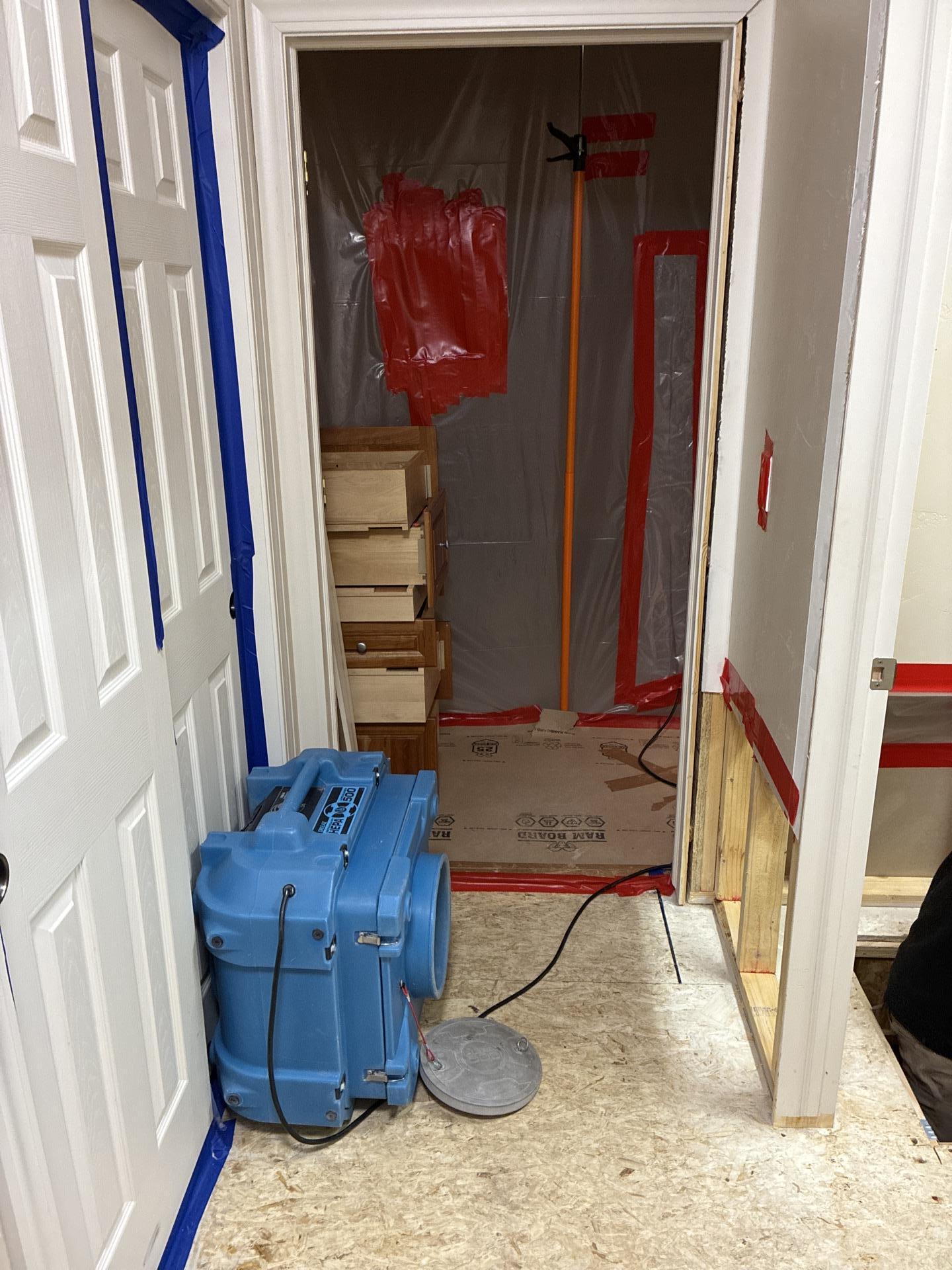Mold remediation underway in crawlspace showing removal of prior encapsulation materials
