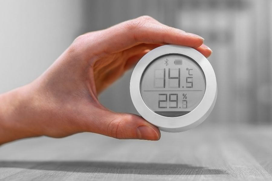 A hygrometer used to monitor indoor humidity levels in a home