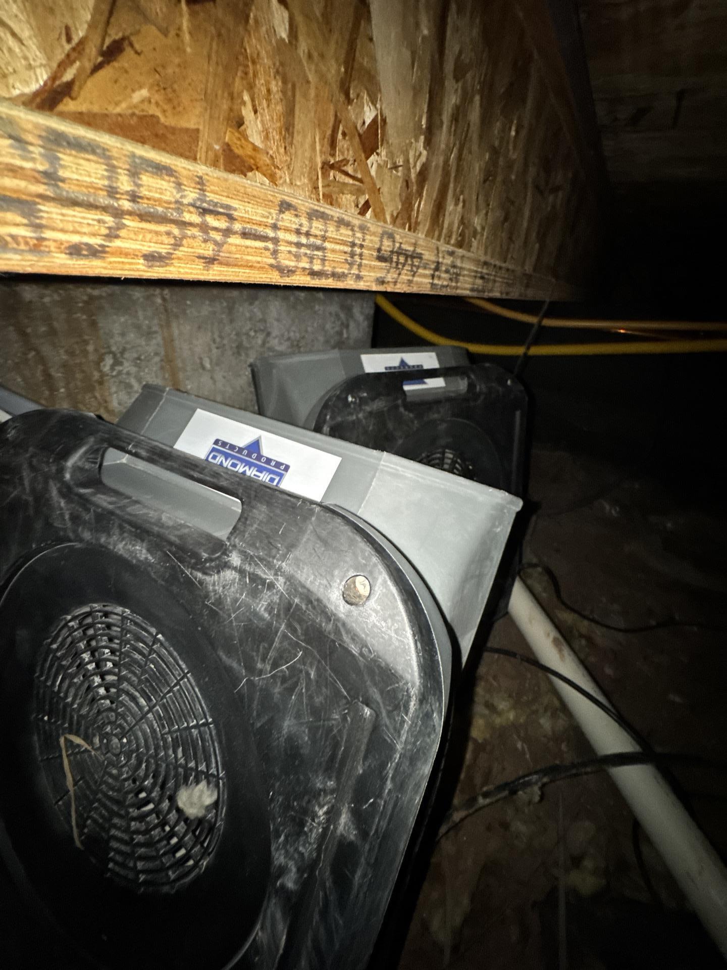 Crawlspace drying equipment left in place to overcome cold temperatures