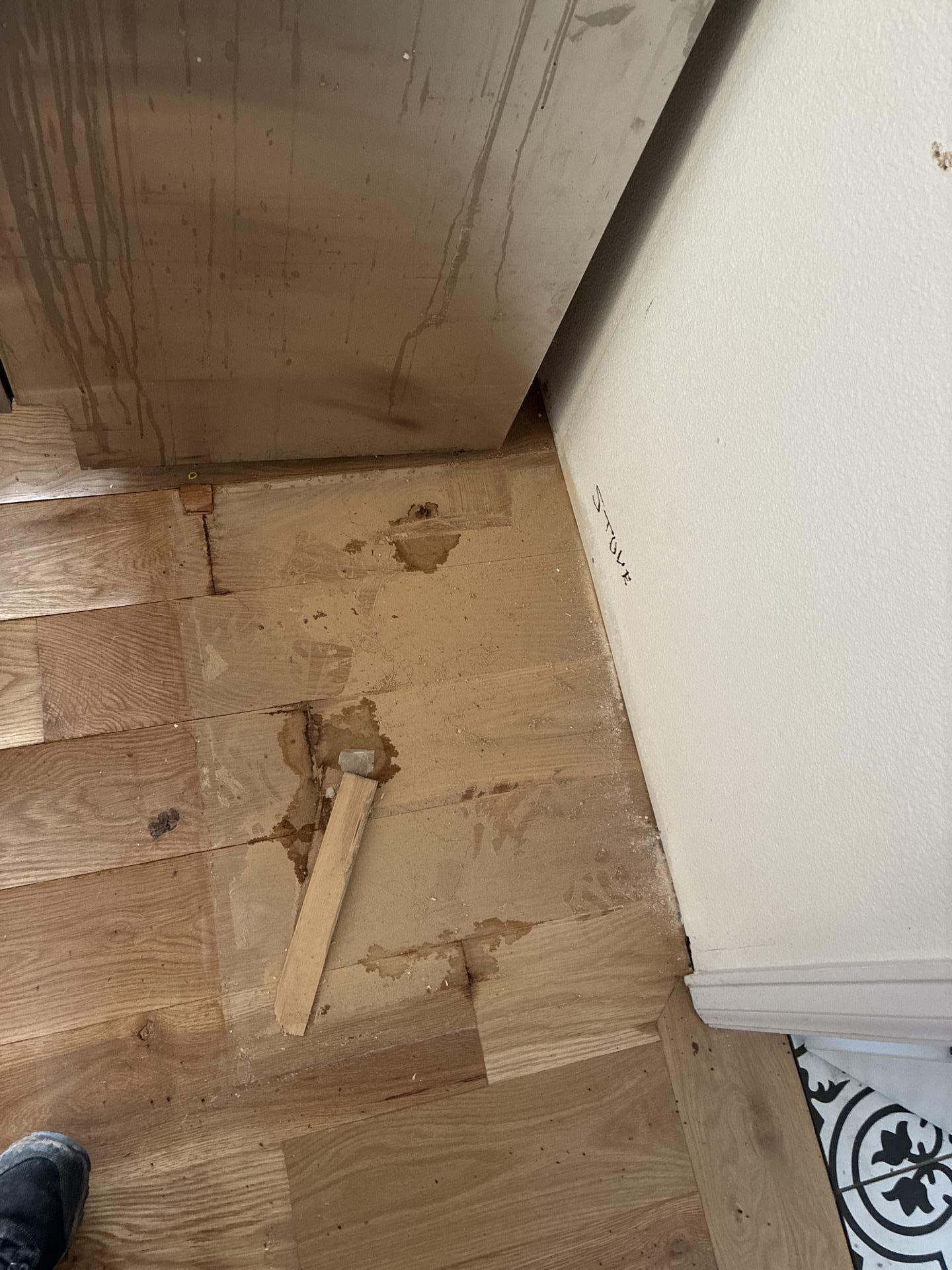 Source of loss identified as an uncapped refrigerator supply line beneath the oven