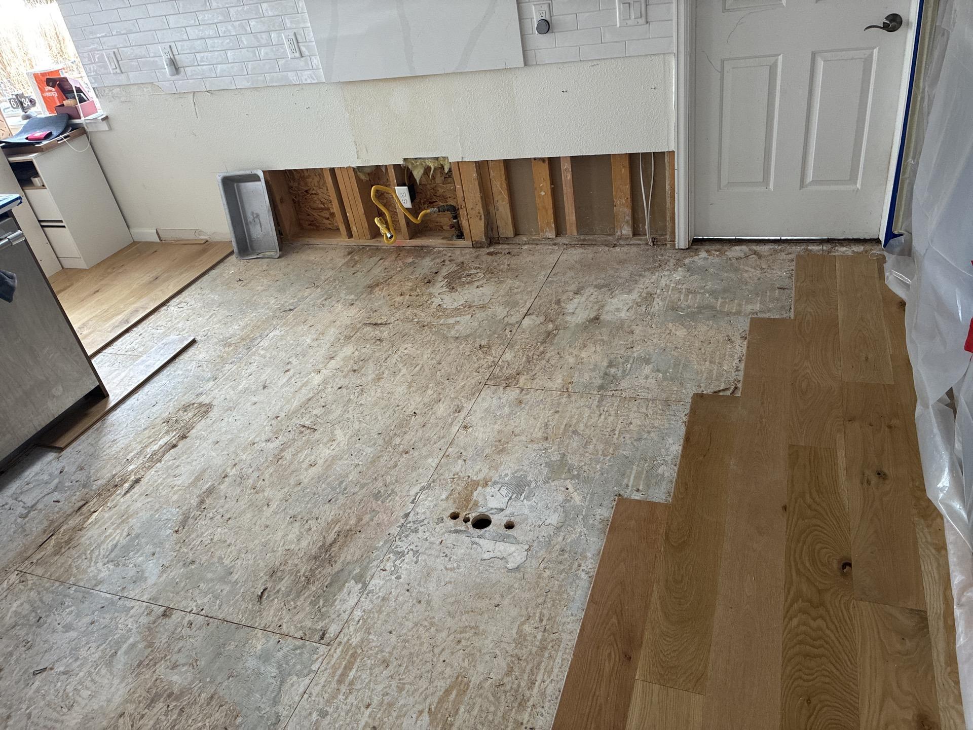 Kitchen flooring area dried and ready for rebuild after water mitigation