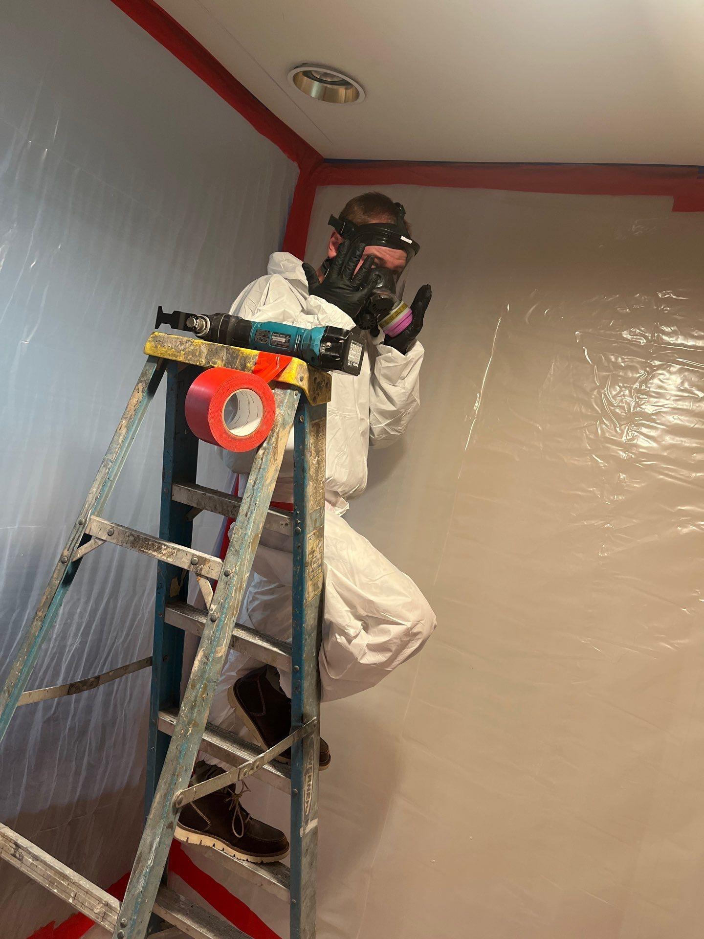 RemediH2O technician in full PPE during mold remediation