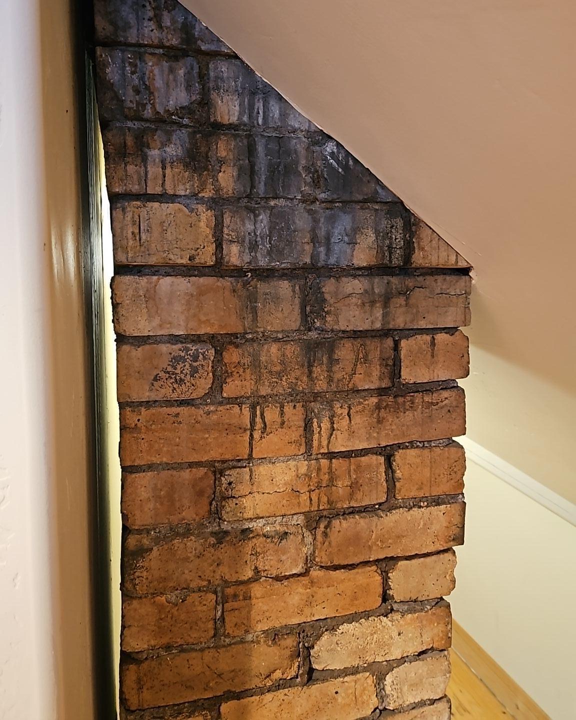 Loft chimney wall assembly contained for mold remediation in a Marble CO home